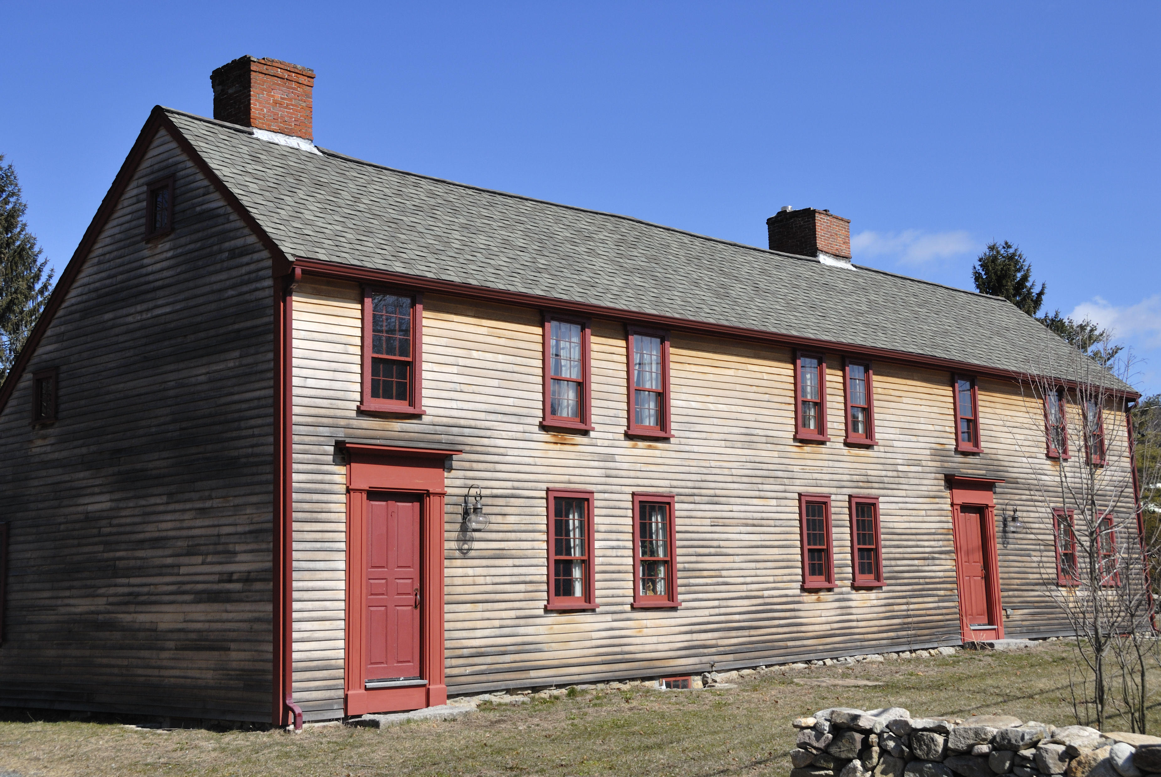 Colonial era house with saltbox roof style